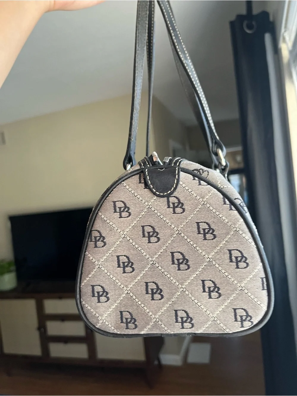 Dooney & Bourke Beige and Black Monogram Barrel Bag with Charm
